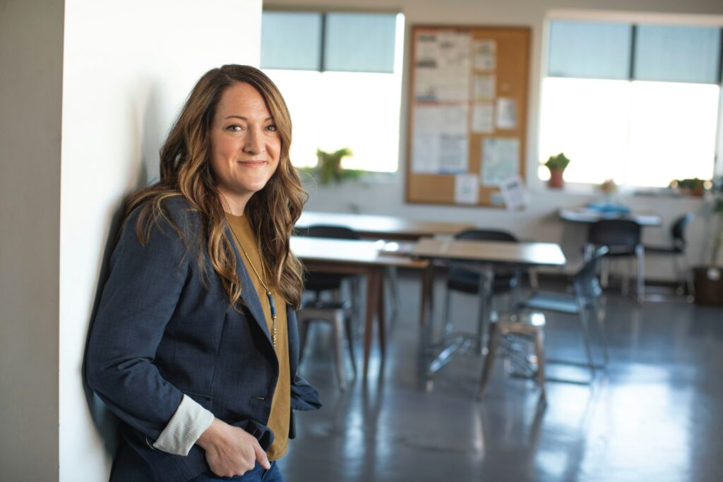 Self-assured professional standing tall after building real confidence