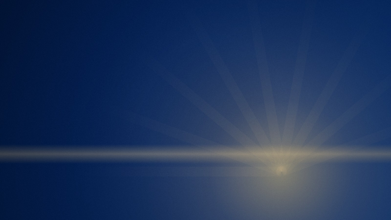 Dawn light breaking over a dark horizon, a symbol of facing the unknown with courage